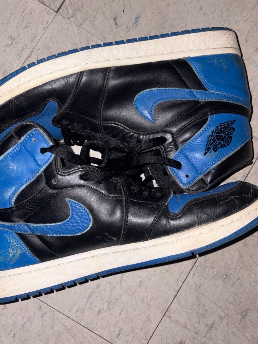 Jordan Men’s High-Top Sneakers in Black and Blue